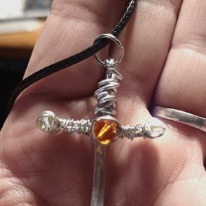 Silver colored wire wrapped sword